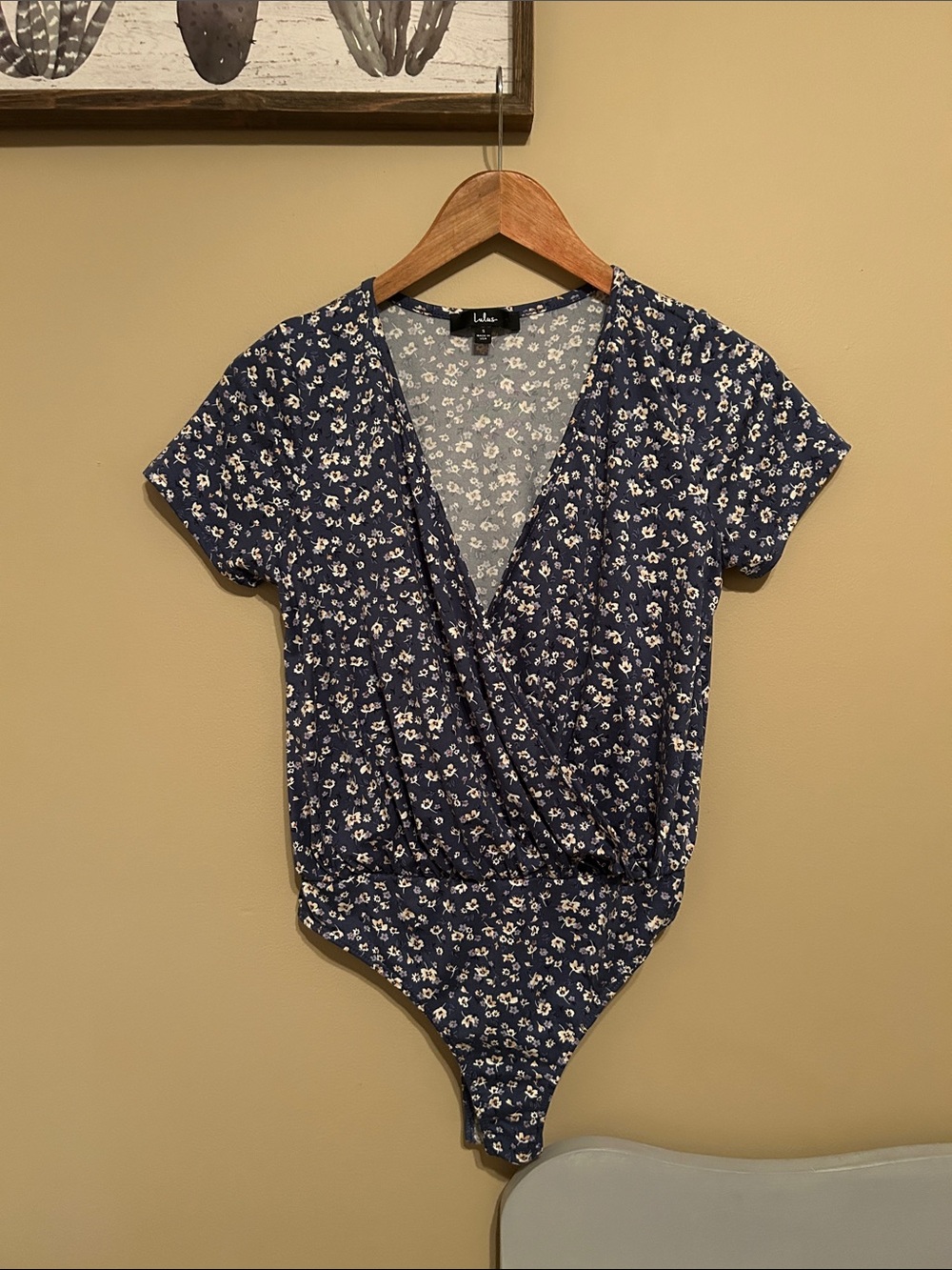 Lulu's Navy Floral Surplice Short Sleeve Bodysuit